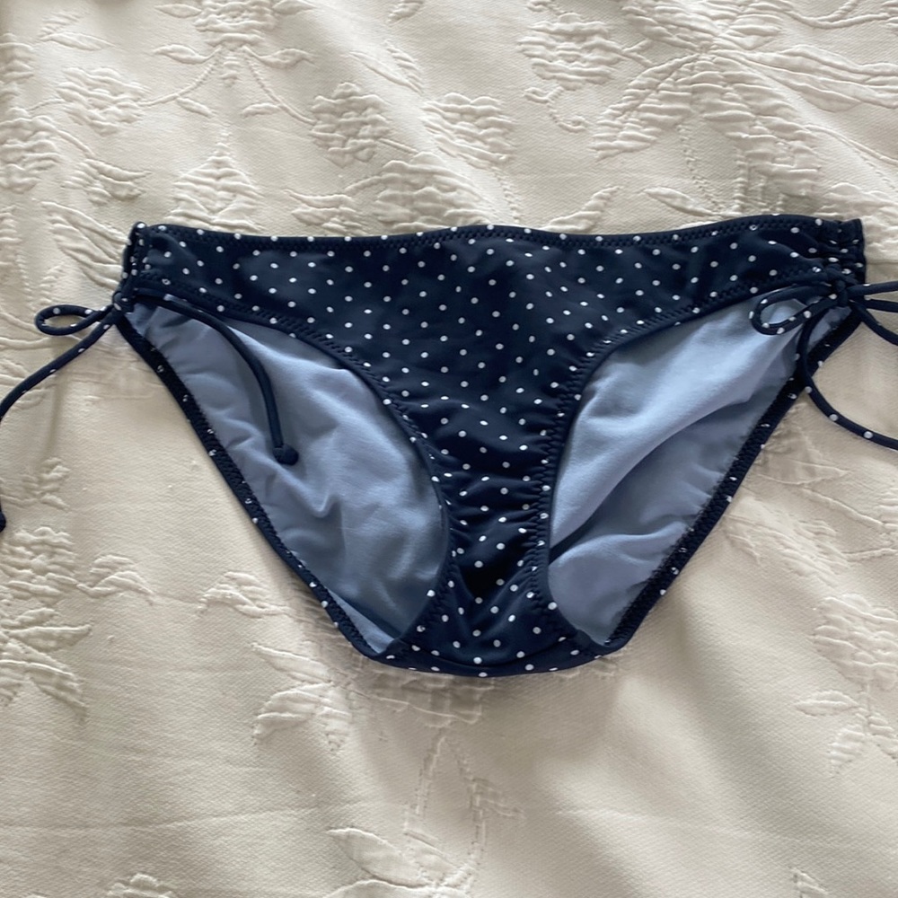 Navy with white polka dot bikini bottom.